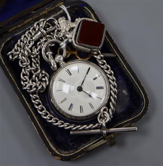 A Victorian silver open face pocket watch, Henry Mills, Oxford Street, London on curb-link chain with uncut swivel seal.